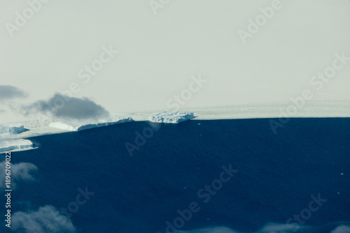 Aerial view of icy coastline of Antarctica.