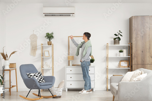 Handsome young man turning ...
