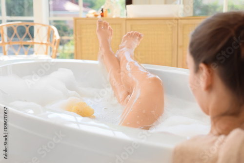 Beautiful young woman takin...