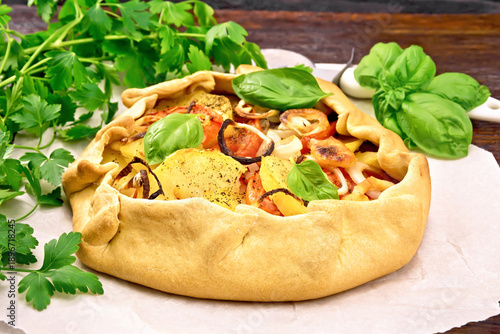 Galette of potato and tomato on board