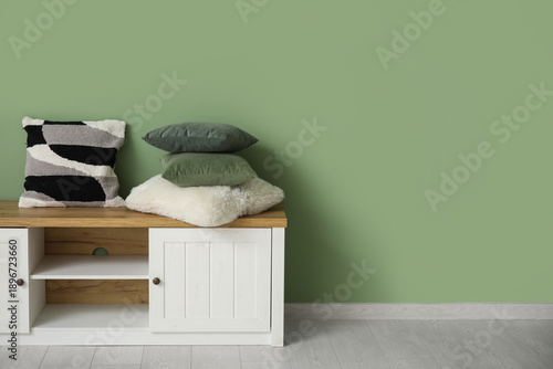 Chest of drawers and pillow...