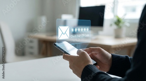 Person entering one-time password on smartphone in modern office workspace, representing digital security and online verification