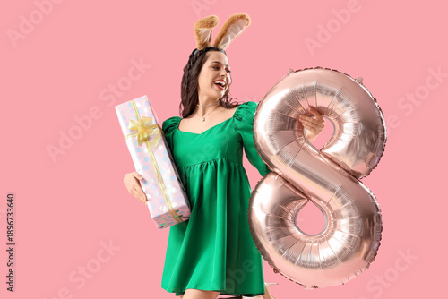 Beautiful woman with gift a...