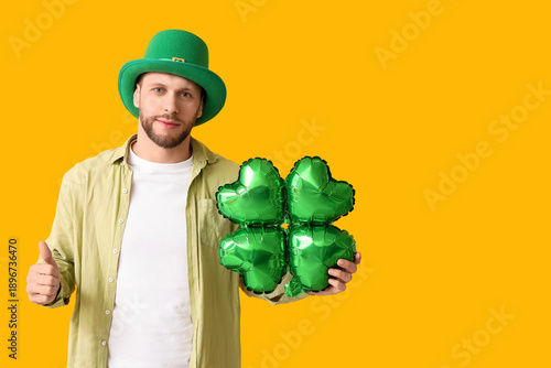 Young man in leprechaun hat...