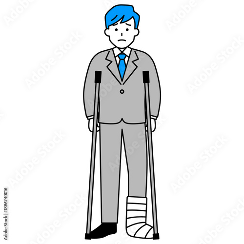 足を怪我して松葉杖をついているスーツの男性
