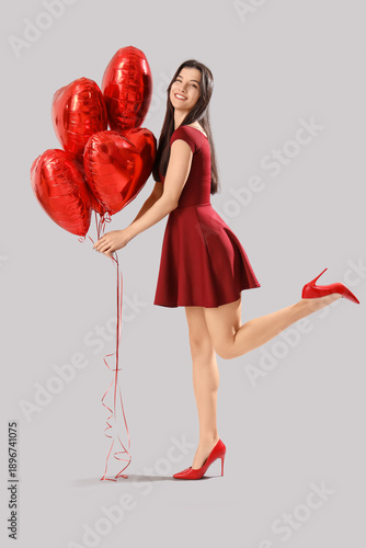 Beautiful young woman with ...