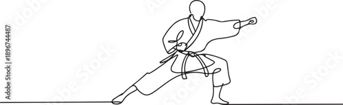 One continuous line drawing karateka fighter in kimono practicing karate kick combat. one line Art icon drawing vector