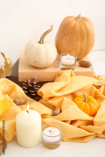 Burning candles with scarf,...
