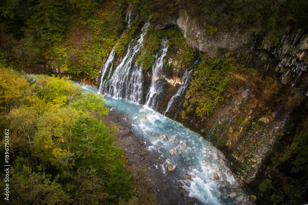 Fototapeta premium The scenery of Shirogane Falls in Hokkaido, Japan