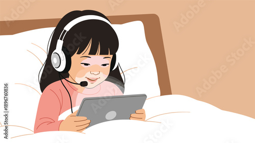 Young girl wearing headphones while using a digital tablet in bed at night, surrounded by white pillows and a brown headboard.