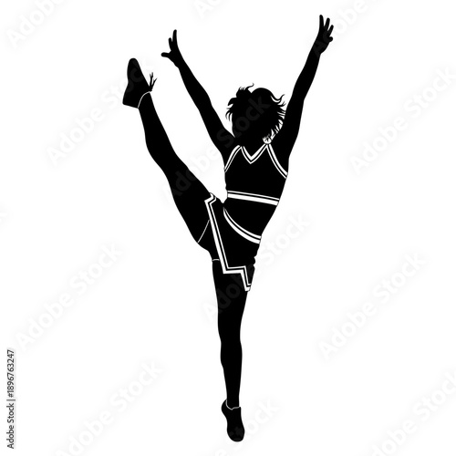 Silhouette of a cheerleader performing a high kick with arms raised
