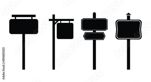 Four black road signs displayed in a stark silhouette