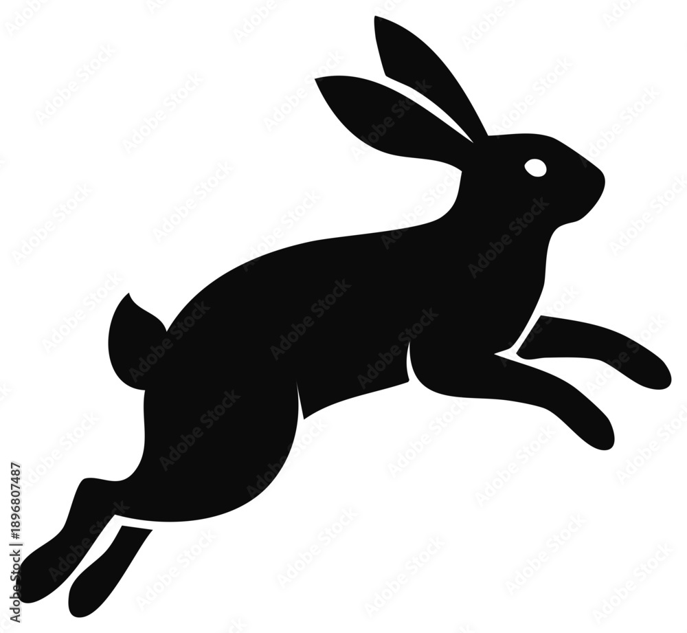 Obraz premium Black silhouette of a rabbit leaping forward mid-air with long ears and a short tail in motion