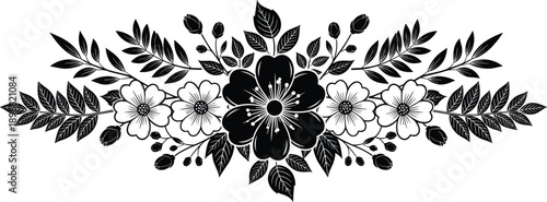 described is a black and white symmetrical floral ornament that showcases a harmonious and intricate design