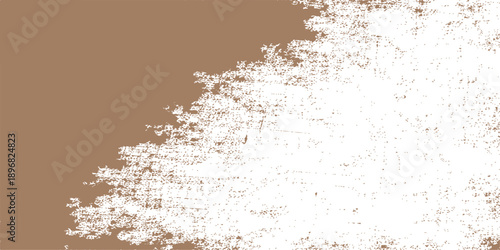Abstract grunge background with white paint on a brown textured wall surface featuring old rust and aged stone patterns for a rough macro design