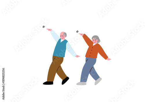 楽しそうに踊るシニア世代の夫婦