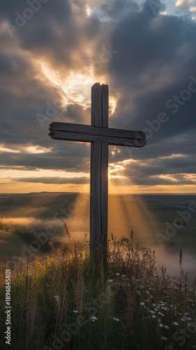 Sacred Ascent: A weathered wooden cross stands silhouetted against a dramatic sky, its silhouette radiating a sense of hope and faith as the sun's golden rays pierce through the clouds.