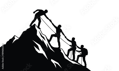 Team of four climbers helping each other ascend steep mountain summit