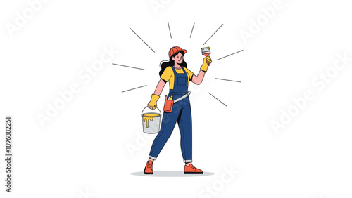 Happy professional female painter wearing overalls and a hard hat holding a paint bucket and a brush for home renovation.