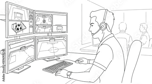 Sports commentator working on multiple computer screens