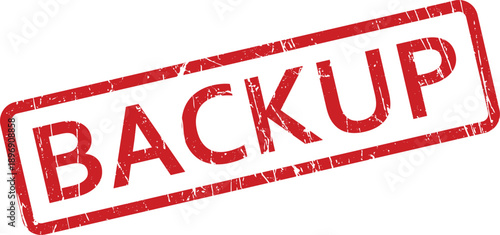 A prominent red rectangular rubber stamp featuring the word BACKUP on a bright white surface