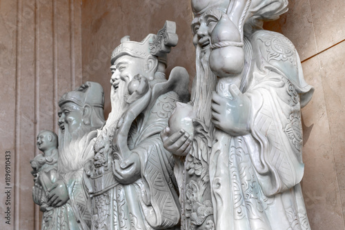 Wallpaper Mural Intricate marble statues of chinese deities with detailed carvings in temple setting Torontodigital.ca