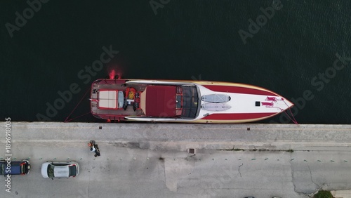 luxury super speed boat in port of igoumenitsa city in greece, epirus, drone view