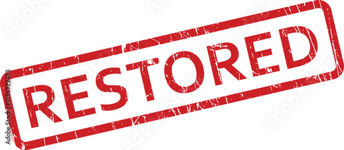 A vibrant red grunge textured rectangular stamp with the word RESTORED prominently displayed on a crisp white background