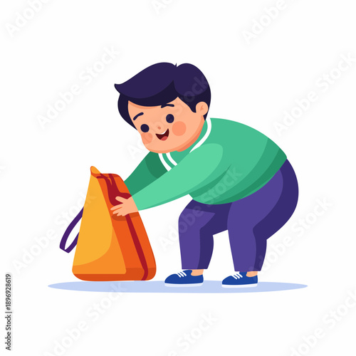 Young Boy Packing School Bag.