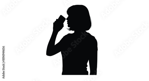 Silhouette of a woman speaking into a vintage microphone side profile