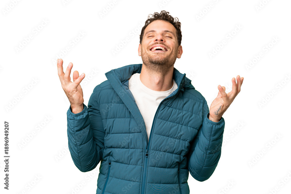 Fototapeta premium Brazilian man over isolated chroma key background smiling a lot