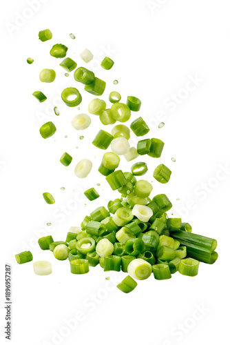 Chopped green onions falling in air isolated on transparent background for garnish or cooking