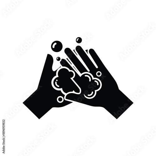 Black silhouette of two hands cupped together with soap bubbles rising