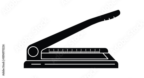 A stark black silhouette of a paper cutter tool displaying its mechanical design and sharp blade silhouette