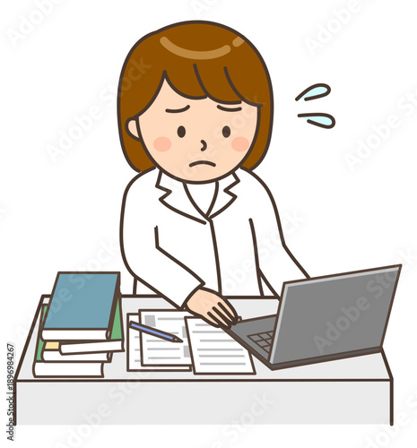 パソコンの前で困っているデスクワーク中の女性医師