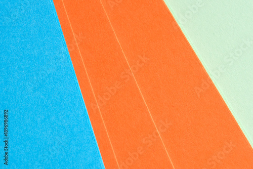 Colorful paper sheets arranged in playful layers and vibrant hues