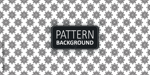 Black and white repeating star floral background