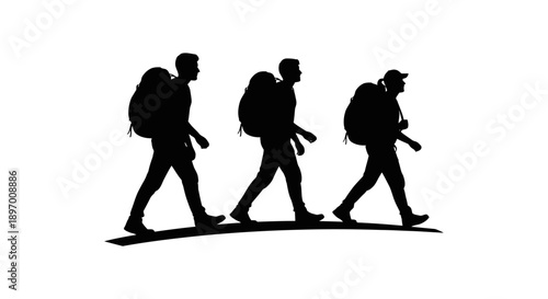 Three hikers with backpacks walking in silhouette.