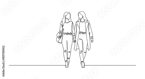 Two young women holding hands walking together outdoors.