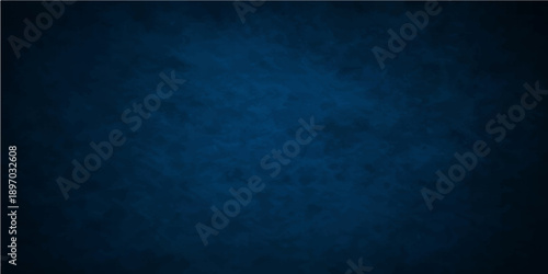 A dark blue grunge background features an old textured wall design with a rough vintage paper pattern and a blank dirty chalkboard material for an artistic backdrop