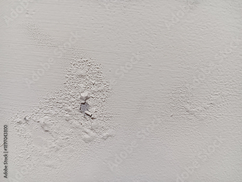 Photos Close up of abstract texture blistering and peeling paint on  white wall surface