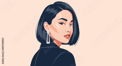 Stylish woman with a black bob haircut looks over her shoulder with a confident and sophisticated expression.