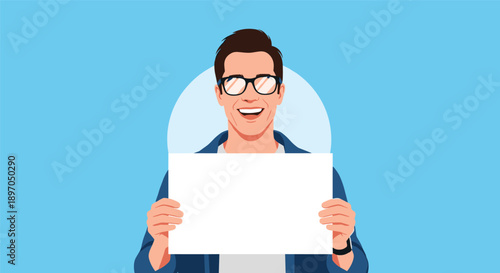 Cheerful young man wearing glasses and a blue shirt holding a blank white board for your message or advertisement against a blue background.