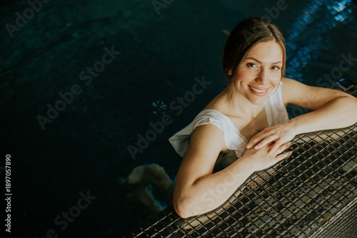 Woman enjoys time in indoor...
