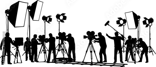 Silhouette of two photographers with studio lighting equipment in a photography session setting on white