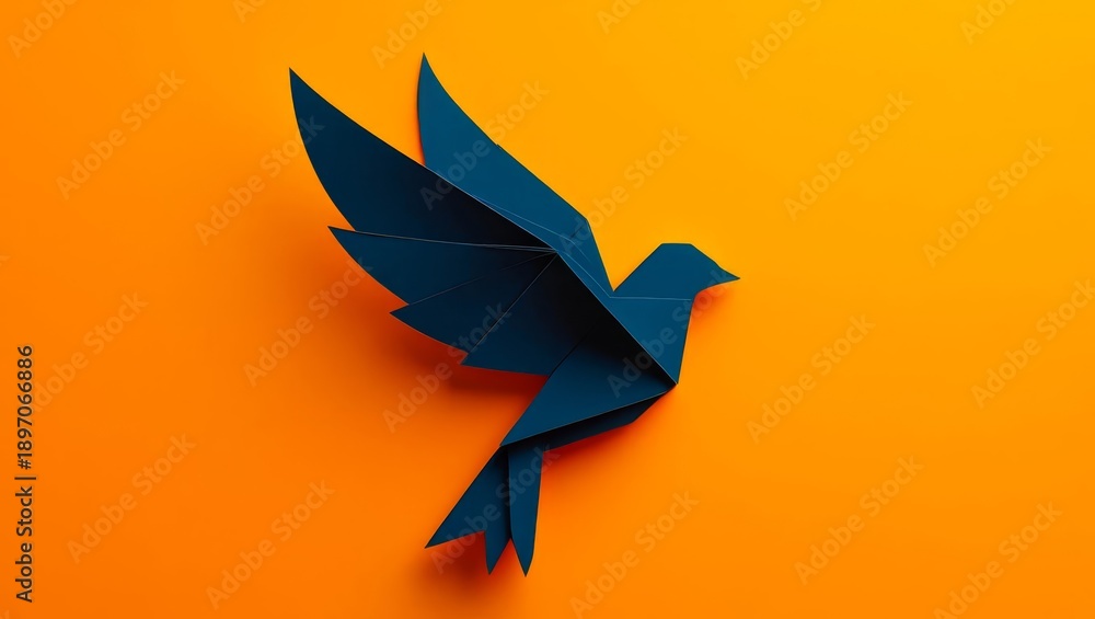 Fototapeta premium One paper black crow with raised wings in the upper right corner on an orange background with space for text.