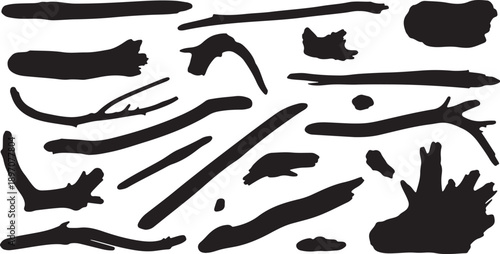 Black silhouettes of various abstract shapes on white background