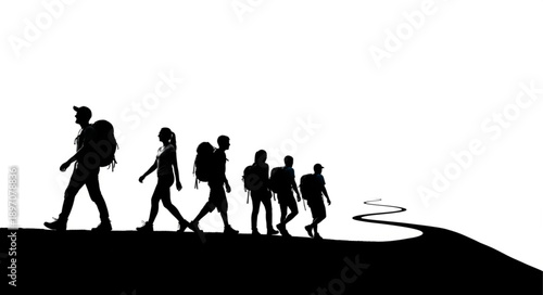 Group of hikers walking on a path with backpacks.
