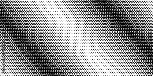 Abstract halftone pattern with a gradual tonal shift from dark to light
