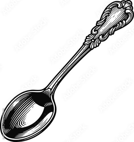 Intricate vintage spoon with ornate handle design, detailed engraving and polished bowl
